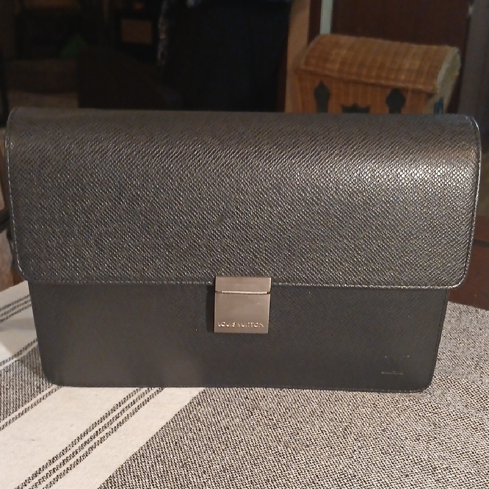 Louis Vuitton Black Textured Leather Wristlet Clutch with Silver-Tone Lock